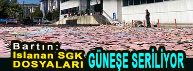 <center> Bartın: Islanan SGK DOSYALARI </center><center><font color=’blue’> GÜNEŞE SERİLİYOR </font></center>
